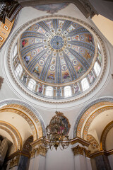 round ceiling in a Catholic church with painting