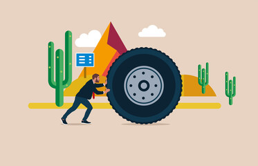 Businessman or manager pushing a car or truck wheel. 