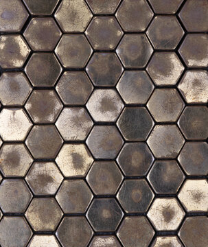 background yellow metal mosaic of hexagons
