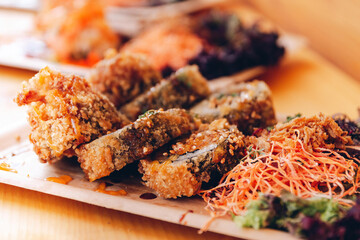 a fish dish with shrimps and vegetables