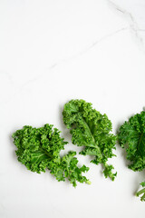 Kale leaves healthy food concept background
