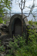 Fototapeta na wymiar Langesund, Norway - May 27, 2022: The Tangen Fort was a German coastal battery. During the Second World War, they built tunnels, rock caverns, trenches, bunkers and gun emplacements.Selective focus.