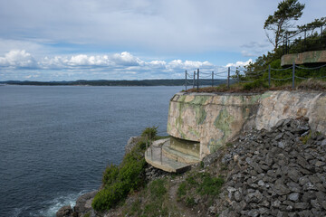 Langesund, Norway - May 27, 2022: The Tangen Fort was a German coastal battery. During the Second World War, they built tunnels, rock caverns, trenches, bunkers and gun emplacements.Selective focus.