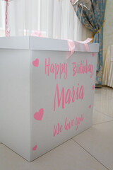 Big white carton with pink ribbon, present box for girl birthday party