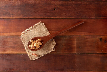 Wooden table with typical Brazilian Festa Junina foods. peanut