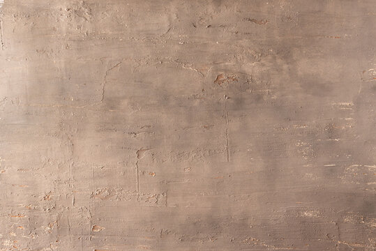 .Gray background imitation of burnt cement