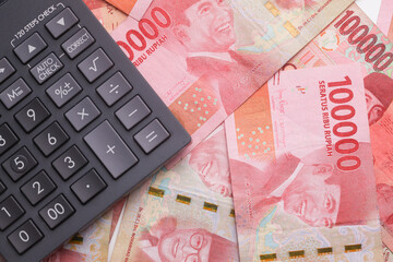 Calculator On Indonesian rupiah cash banknotes money