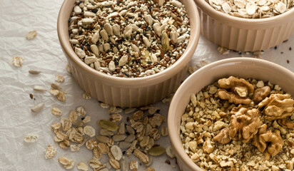 seeds, nuts and cereals in a bowls