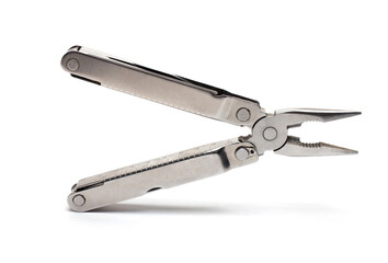 Closeup combination pliers jackknife white background shadow