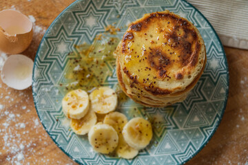 tower of pancakes with banana and kiwi jam