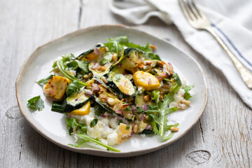 Baby courgette salad on ricotta cheese