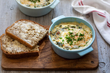 Egg baked in spinach and bechamel sauce