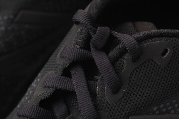 Close up photo of black shoes rope