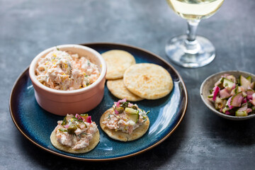 Party canapes, blinis with salmon spread