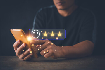 Customer satisfaction and service quality survey concept, Businessman pointing a face and star icon...