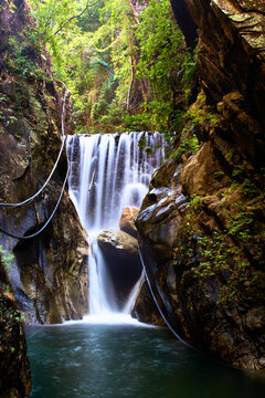 waterfall of palo maria puerto vallarta cascade natural in a green and beautiful river vertical picture 