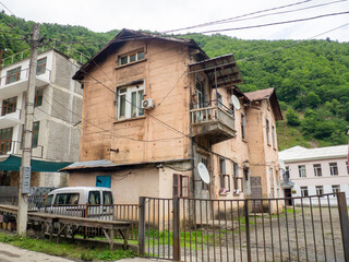 Old building in nature. Housing in the mountains. Quiet place .