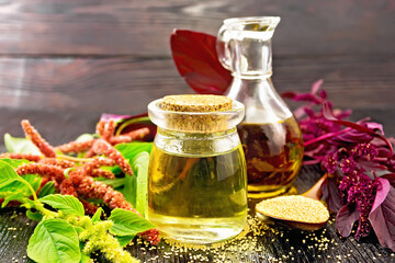 Oil amaranth in jar on table