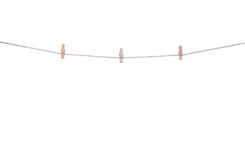 Blank wood clothes pins three patterns hanging on brown rope isolated on white background , clipping path