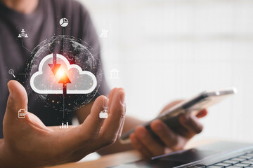 Big data analytics and business intelligence (BI) concept on a digital screen interface and a businessman working with a smartphone and computer laptop in the background.