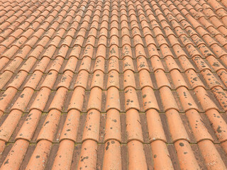 Close-up of red clay roof tiles as a background
