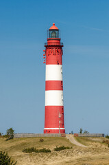 Leuchtturm in einer Dünenlandschaft 3