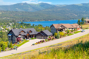 Hillside view from a suburban subdivision of Liberty Lake, a small lake near Spokane, Washington, USA - obrazy, fototapety, plakaty