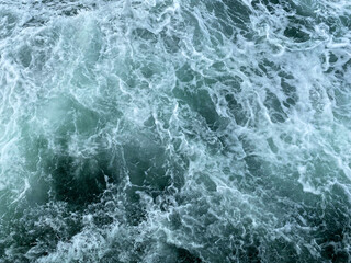 Obraz na płótnie Canvas Beautiful dark blue sea wave with water ripple background