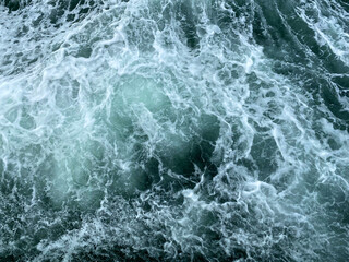 Fototapeta na wymiar Beautiful dark blue sea wave with water ripple background