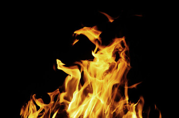 Close up burning flames on black background for graphic design or wallpaper