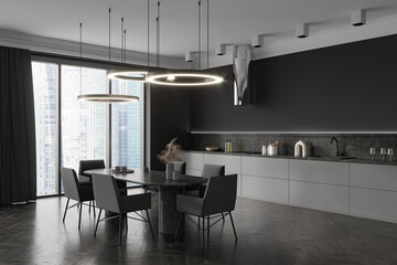 Grey kitchen interior with eating table and seats, kitchenware and window