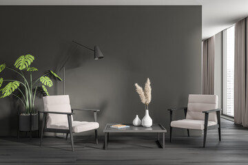 Grey chill room interior with two seats and coffee table, panoramic window