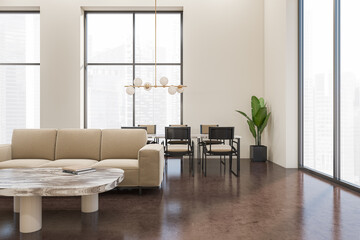 Stylish meeting room interior with couch, table and seats, panoramic window