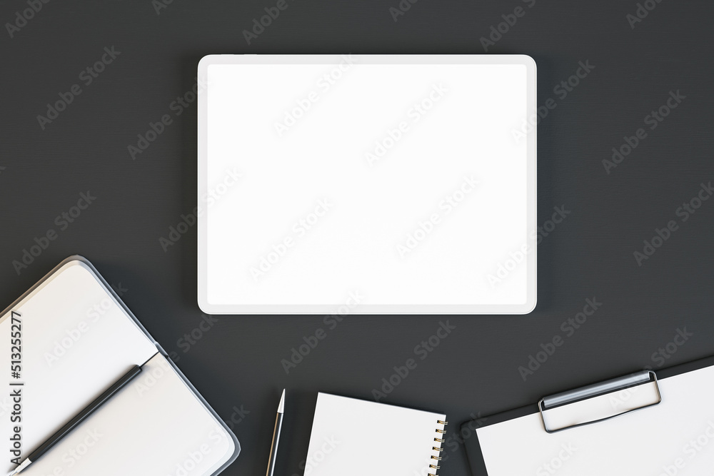Aufkleber Top view and close up of empty white tablet on black desktop with supplies. Work place and stationery objects concept. Mock up, 3D Rendering.