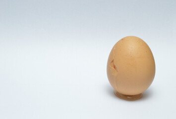 cracked egg on white