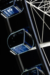 Night view to illuminated ferris wheel