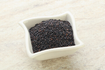 Black sesame seeds in the bowl