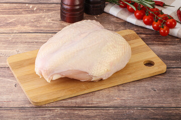 Raw chicken breast with bone