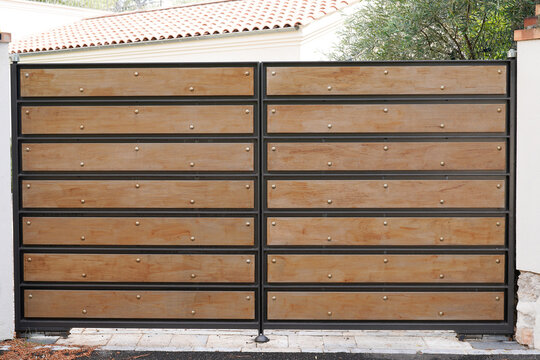 door wooden natural steel brown gate of private house suburb portal
