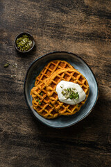 pumpkin waffles on a dark wooden background