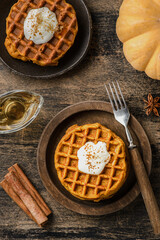 pumpkin waffles on a dark wooden background