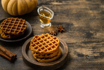 pumpkin waffles on a dark wooden background