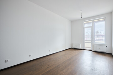 Interior of new apartment without finishing in gray tones