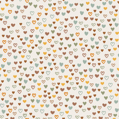 Seamless pattern design with colorful hearts in boho style. Vector romantic background. Great for fabric, textile, apparel.