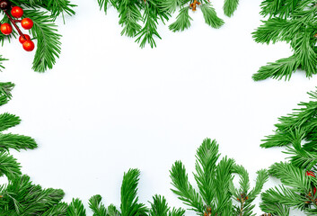 Merry Christmas and happy New year. Mockup with postcard and branches of Christmas tree on white background with copy space. Top view. Christmas background.