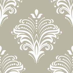Floral ornament. Seamless abstract classic background with flowers. Pattern with repeating floral white elements. Ornament for fabric, wallpaper and packaging
