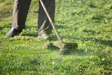 Lawn mover on green grass. Machine for cutting lawns.