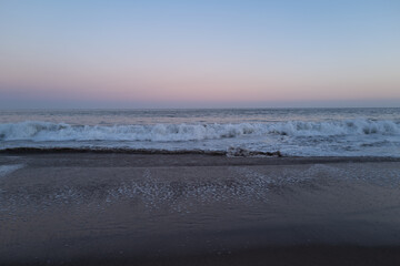 Blue sea with clear water. Ocean deep indigo in daylight. Feeling calm and relaxing. The idea for ocean background and copy space.