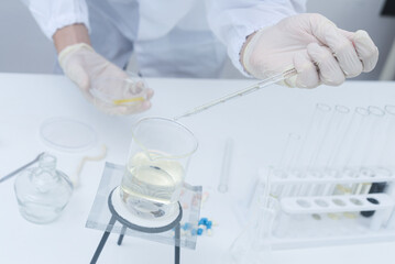 One experiment is conducted in the laboratory with the heating of the liquid. High quality photo