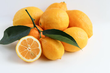 ripe yellow lemons isolated on white background